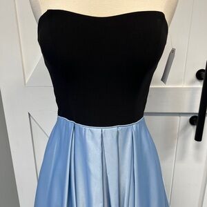 Only worn once. Beautiful bridesmaid/prom dress. Was hemmed to fit 5' 2".